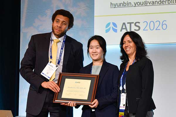 HyunBin You, PhD, MSN, RN, (center) receives the ATS Fellowship